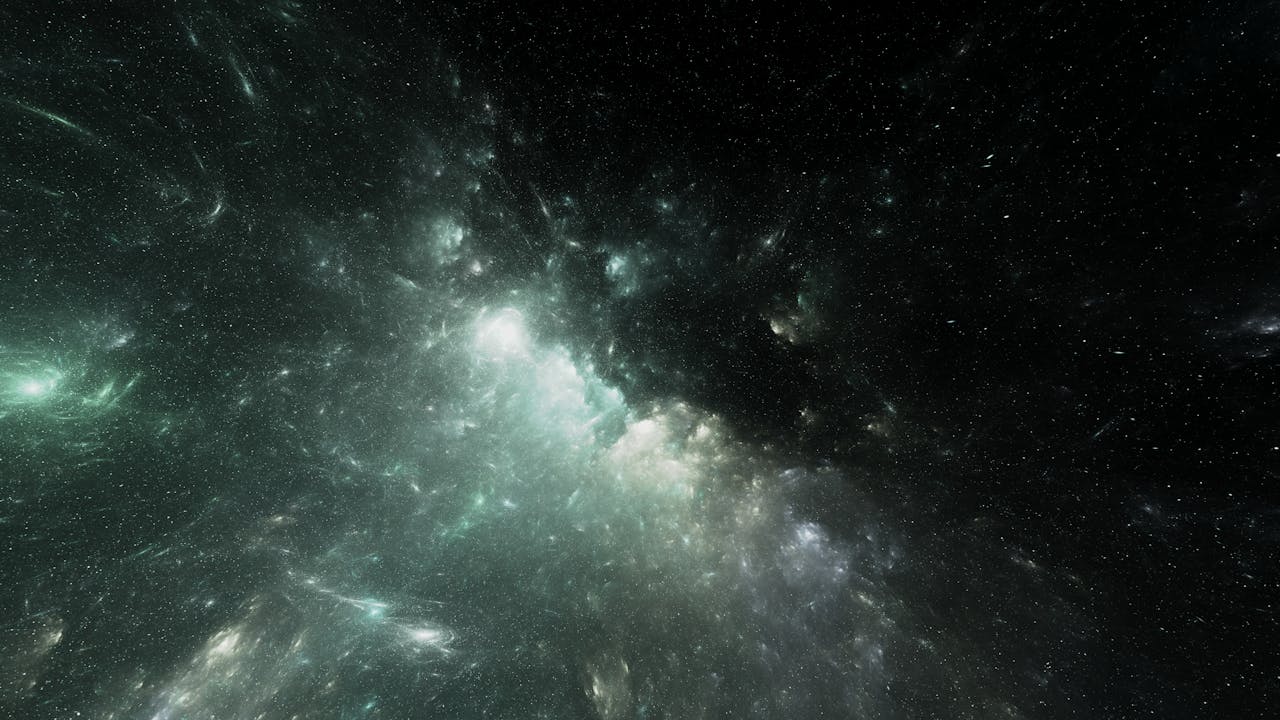 Ethereal image of a colorful nebula set against the vast starry cosmos.